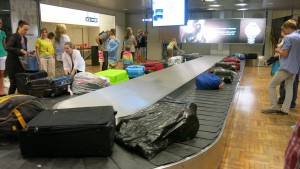 After a flight they are returned to a conveyor belt, unattended.